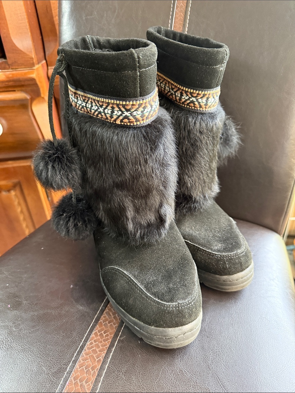Minnetonka Black Suede and Rabbit Fur Mid-Calf Boots with Pom Pom Trim